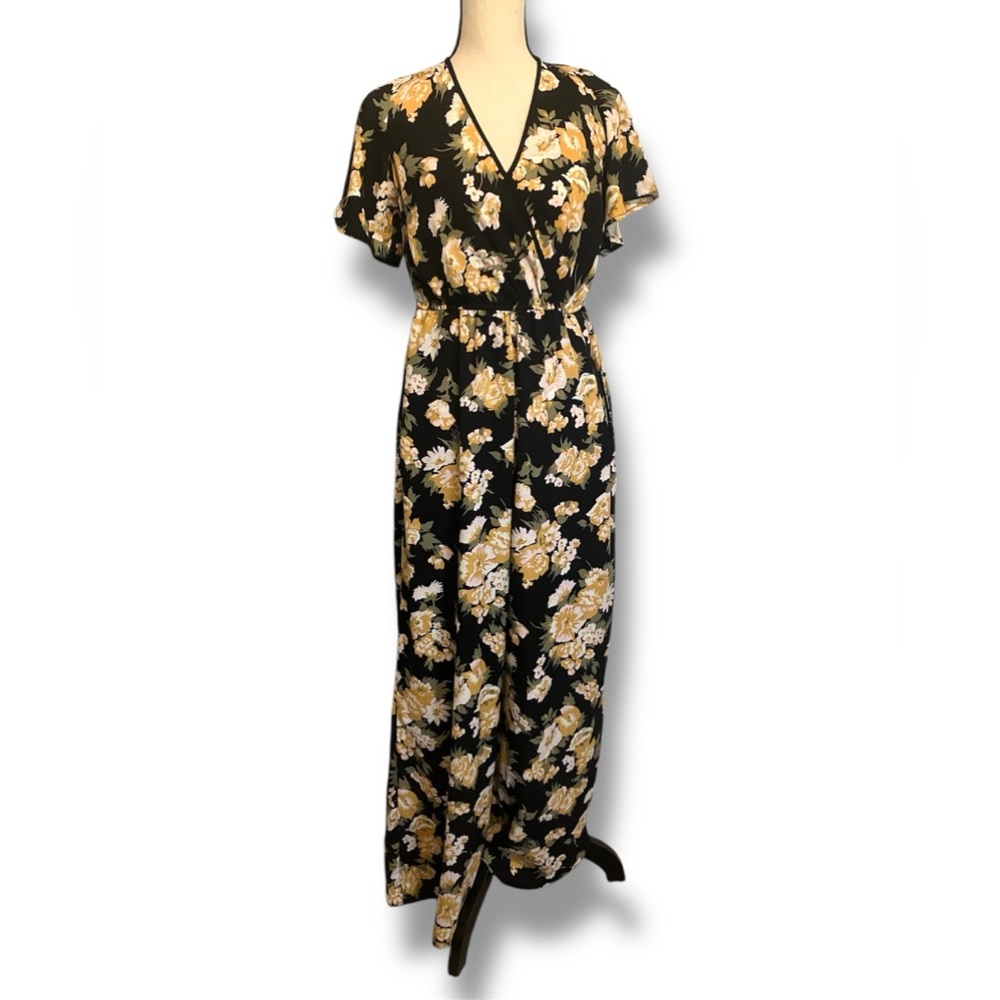 Black jumpsuit with yellow flowers